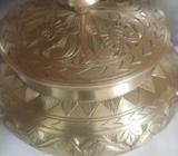 একটি পিতলের তৈরি নকশা করা ছোট পাতিà¦